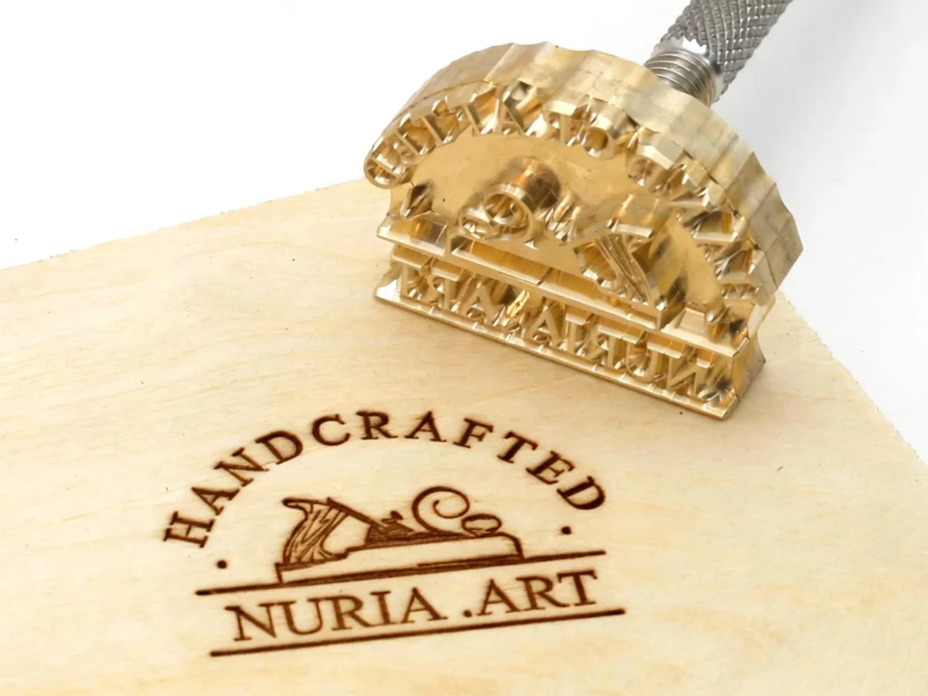 A hot stamping machine precisely branding a custom logo onto a wooden board for a professional woodworking project.