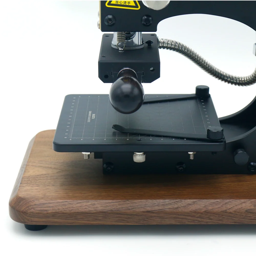 ZHENGFEI EC-17 Hot Stamping Machine Worktable with Positioning Clamps ZHENGFEI EC-17 worktable with precision scale & clamps for accurate leather stamping alignment.