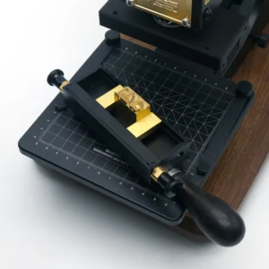 ZHENGFEI EC-17 with custom brass letter mold mounted on precision worktable for leather branding.