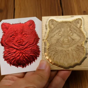 ZHENGFEI 3D raccoon relief brass die, 0.01mm CNC engraved for handmade craft stamping.