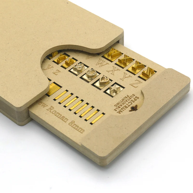 ZHENGFEI 8mm Times New Roman Brass Letter Set with Eco-Friendly Storage Box ZHENGFEI 8mm brass letter stamp set with eco storage box, 0.01mm CNC engraved for leather hot stamping.