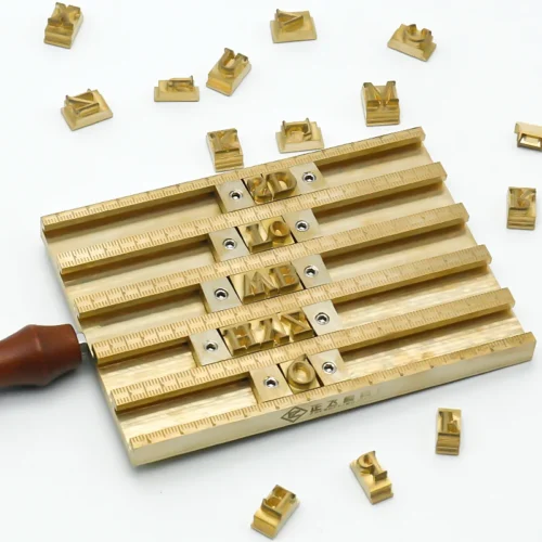 ZHENGFEI Brass Letterpress Holder with HAPPY HANDMADE Lettering ZHENGFEI brass letterpress holder with "HAPPY HANDMADE" lettering for handmade leather craft branding.