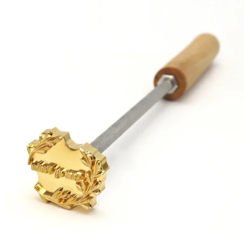 ZHENGFEI Custom Laurel Wreath Badge Brass Branding Iron with Wooden Handle ZHENGFEI custom laurel wreath badge brass branding iron for premium leather and wood product branding.