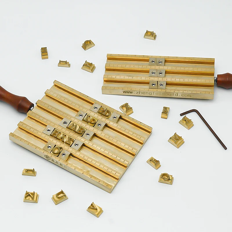 ZHENGFEI Dual Size Brass Letterpress Holders Set with Loose Letters ZHENGFEI dual size brass letterpress holders set for flexible multi-size lettering in leather hot stamping.