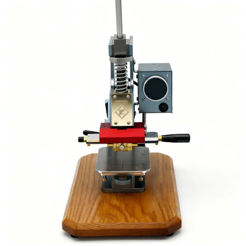 ZHENGFEI ELC-01 hot stamping machine with dual-handle heating head for leather embossing and branding.
