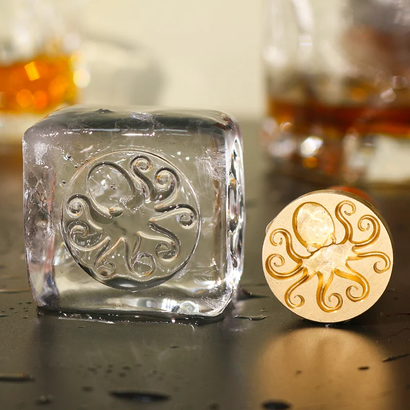 ZHENGFEI octopus brass ice stamp die, 0.01mm CNC engraved for custom whiskey ice cube branding.