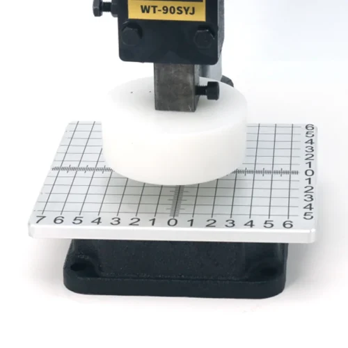 ZHENGFEI WT-90SYJ Pressing Head & Scale Worktable Close-up Close-up of ZHENGFEI WT-90SYJ pressing head and precision scale worktable for accurate craft positioning.