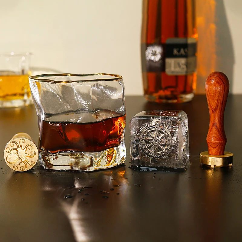 ZHENGFEI wooden handle brass ice stamp set with compass & octopus designs for whiskey ice branding.