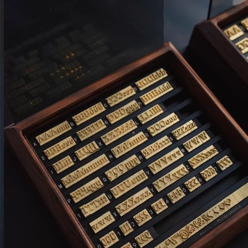 ZHENGFEI brass alphabet number symbol stamp set in walnut storage box for leather hot stamping.