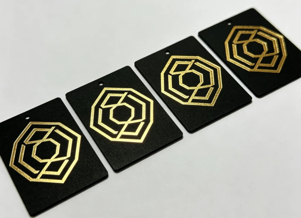 Series of ABS plastic tags gold foil stamped on TJ8020PS machine with silicone mold at 190°C