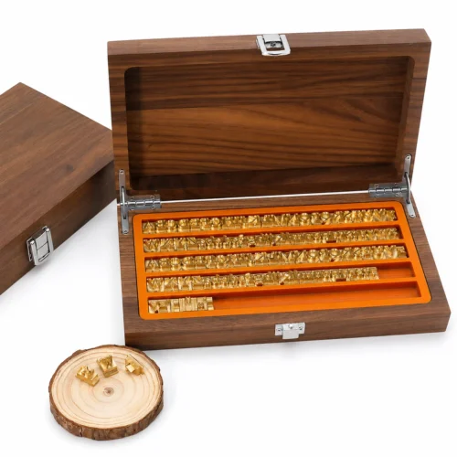 Brass letter number set with walnut wooden case plus loose brass characters on wood slice for leather wood marking