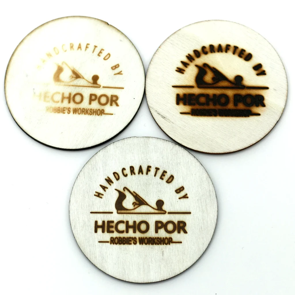 WT-90DS test compares pale, clear, and charred logo marks on thin wood at different temperatures