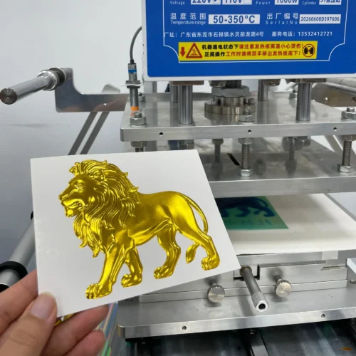 WT-QY300 3-ton hot foil stamping machine golden lion relief foil sample on glossy cardstock at 140°C