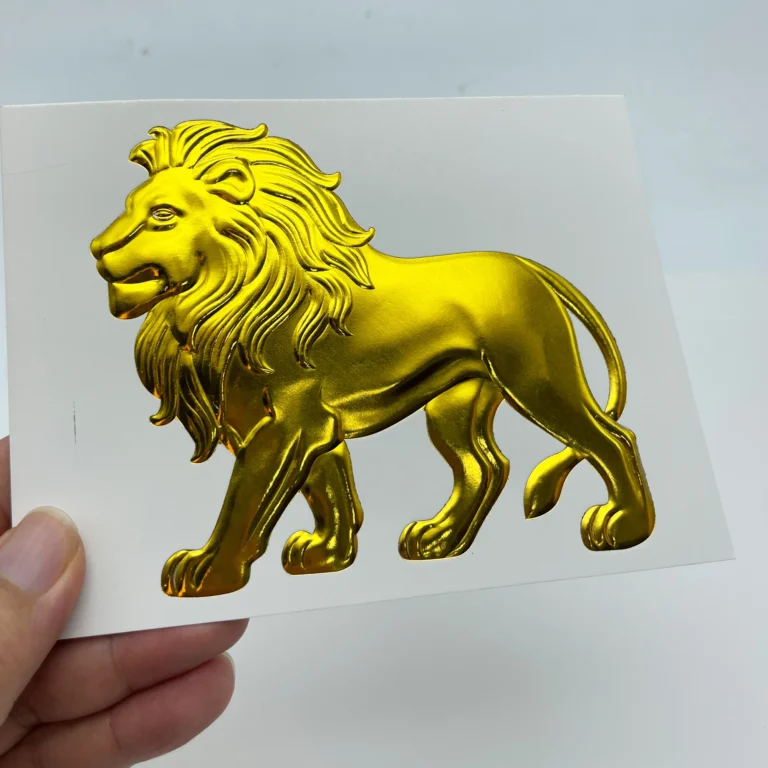 WT-QY300 hot stamping machine gold lion relief foil sample on glossy cardstock, optimal 140°C complete foil transfer